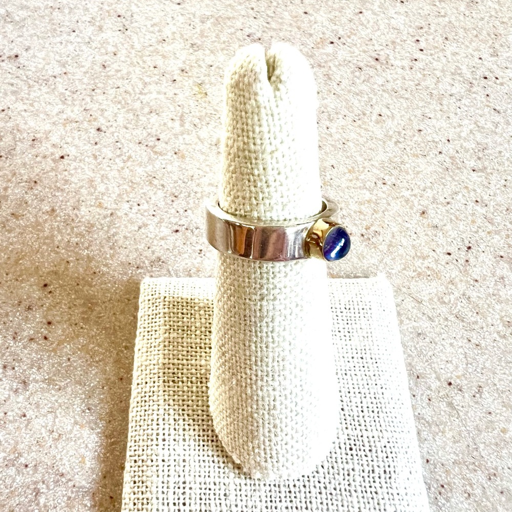 Tanzanite set in 14 KT Gold on Sterling Silver Band